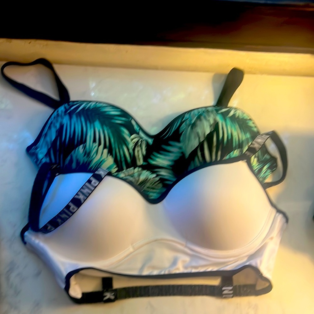 Lot of 2 cage back sports bras. Might have been tried once but excellent new.